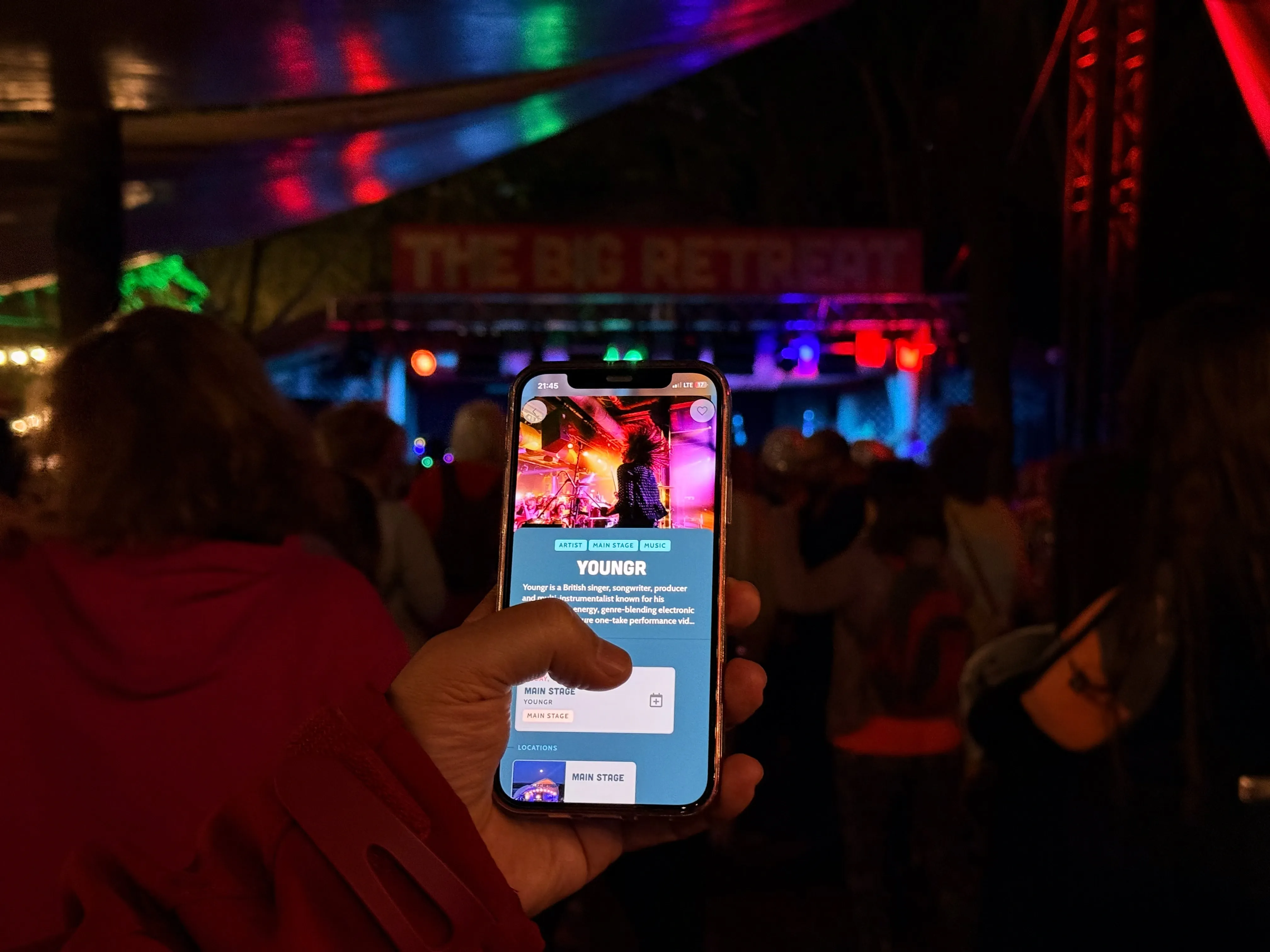 A festival attendee using The Big Retreat Festival's app